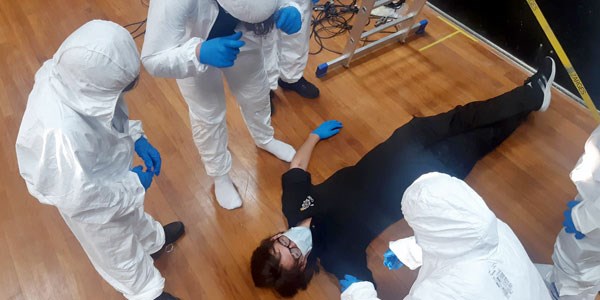 Cadets role playing a murder crime scene